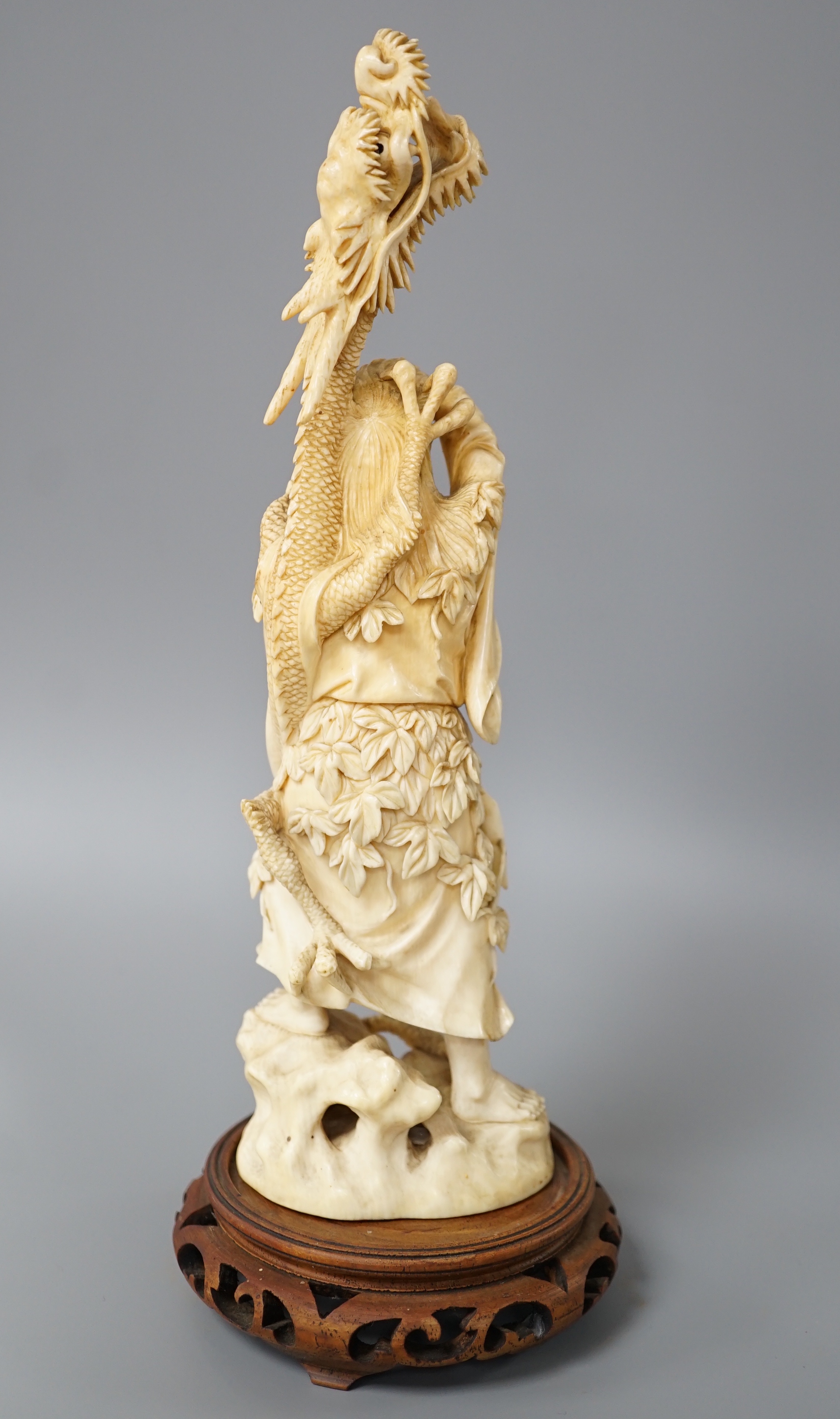 A Japanese ivory okimono of Shoshi Sennin and a dragon, early 20th century, signed, associated - Image 6 of 8