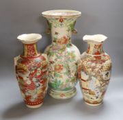 Two Japanese Satsuma vases, 30cm high, together with another (3)