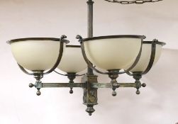 A brass 4 branch ceiling light with opaque glass shades,72 cms high x 94 cms wide.