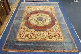 A modern Turkish Mamluk style carpet,with field of polychrome geometric foliate decoration and