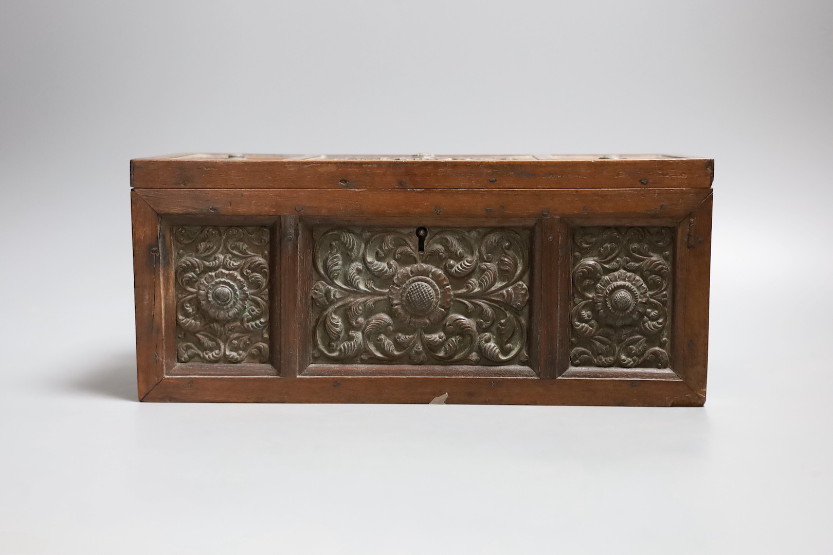 A carved wood panelled box, stamped The Madras School of Art, with label dated 1897, 29cm - Image 2 of 4