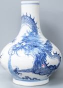 A Chinese blue and white ‘dragon’ bottle vase 32cm