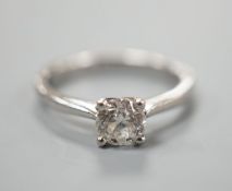 A modern platinum and solitaire diamond ring, size K, gross weight 3.6 grams,the stone weight