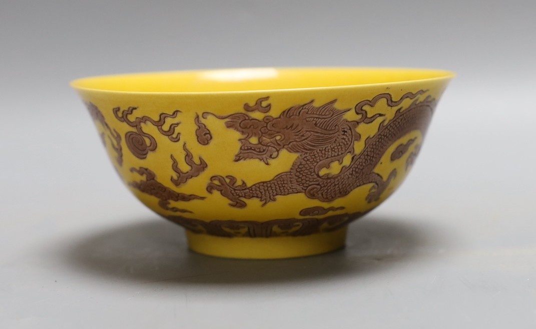 A Chinese yellow ground 'dragon' bowl, 15cm diameter