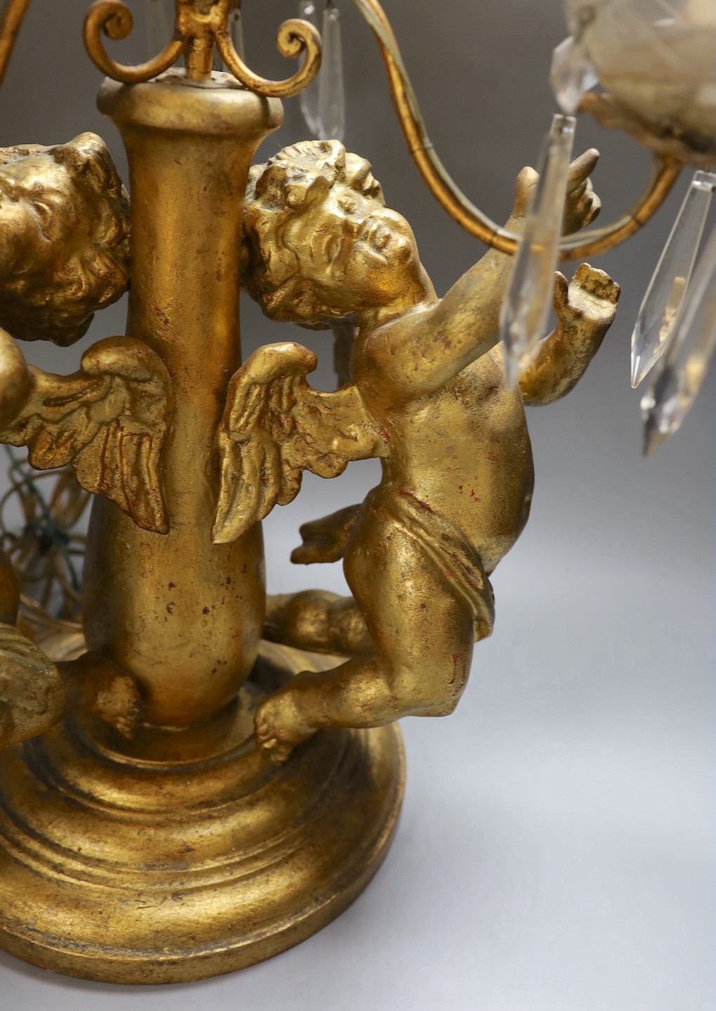 An Italian three branch gilt cherubs decorative lamp with cut glass lustre drops - 64cm high - Image 2 of 2