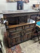 An 18th century style oak court cupboard, length 108cm, depth 43cm, height 128cm