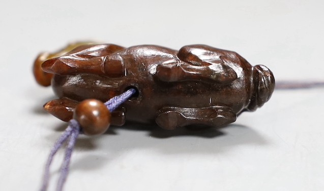 A Chinese green and brown jade ‘horse’ toggle. 4.5cm - Image 3 of 4