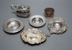 A late Victorian silver mustard, Sheffield, 1895, two small silver armada dishes, a silver bonbon