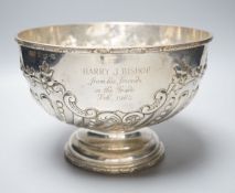 A George V embossed silver rose bowl, with later engraved inscription, Daniel & Arter, Birmingham,