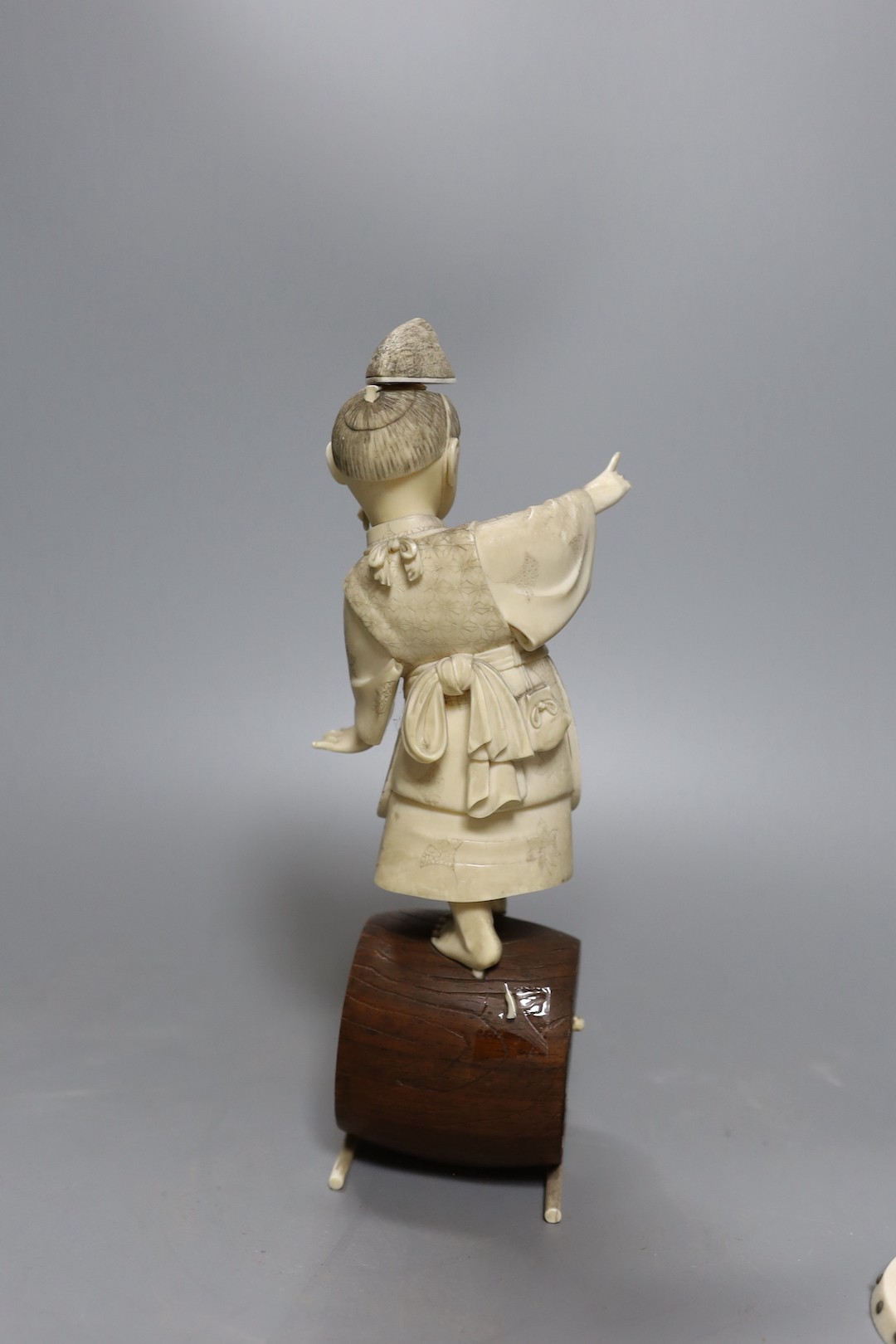 A 19th century Japanese ivory okimono, boy on a barrel with red seal to base, 24cm, together with - Image 3 of 4