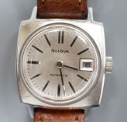 A lady's stainless steel Bulova manual wind wrist watch, on a Hirsch leather strap.