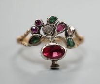 An early 20th century continental? Arts & Crafts yellow metal and multi gem set cluster ring, size