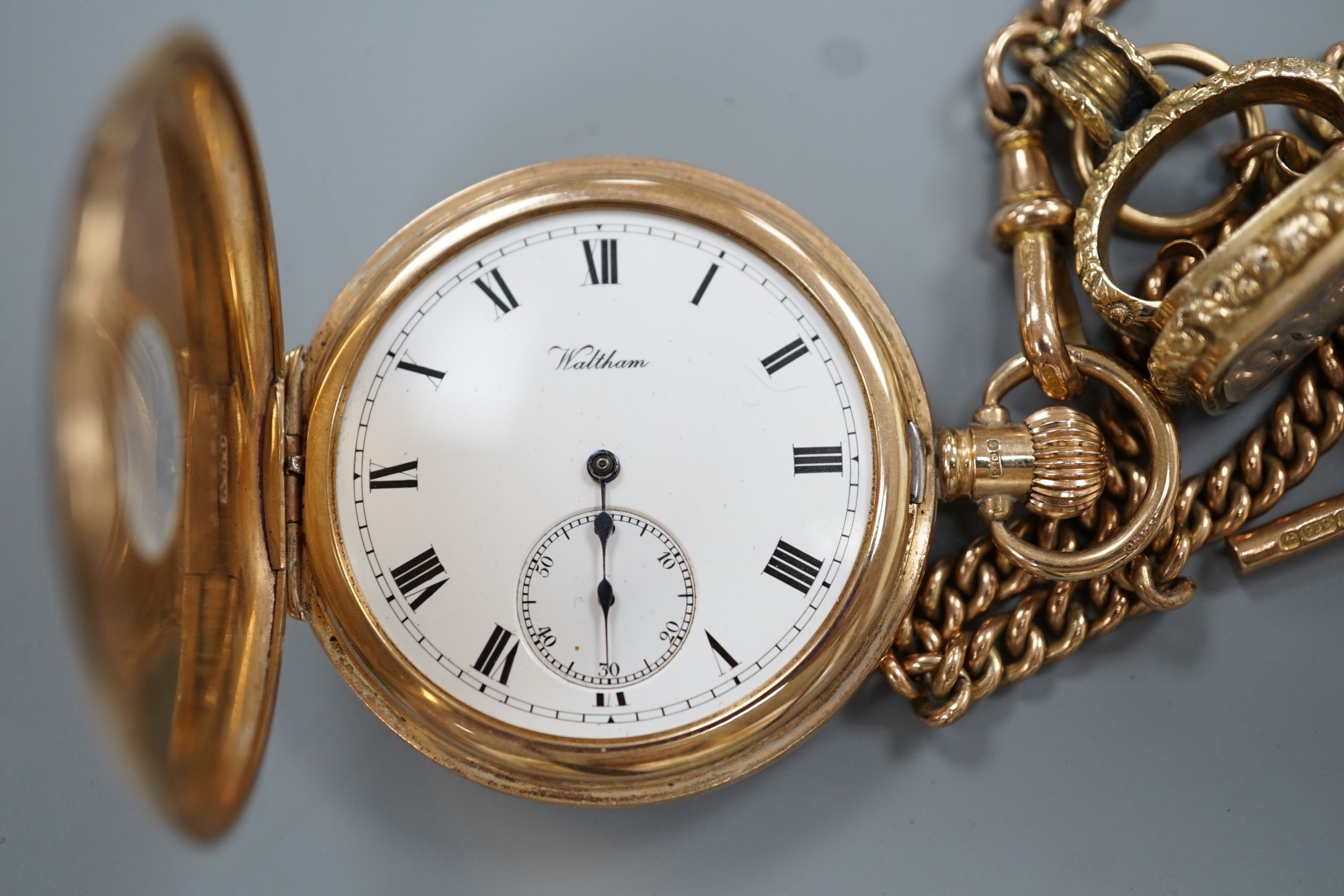 A 1920's 9ct gold Waltham keyless half hunter pocket watch, on a 9ct gold albert, hung with a - Image 2 of 5