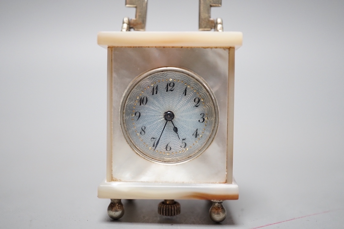 A miniature Swiss mother of pearl timepiece, engraved Brevet above a cross and numbered 338174 cms - Image 2 of 4
