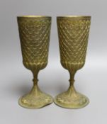 A pair of ornate gilt metal goblets,22cms high.