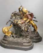 A pair of spelter warriors on horseback in action on mounted base, tallest 51cm
