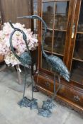 A pair of bronzed metal crane garden ornaments, larger height 136cm