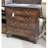 A small George III mahogany chest of three graduating long drawers and fitted slide, width 79cm,