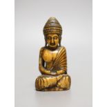 A Thai ivory buddha, probably 8th / 9th century,9cms high.