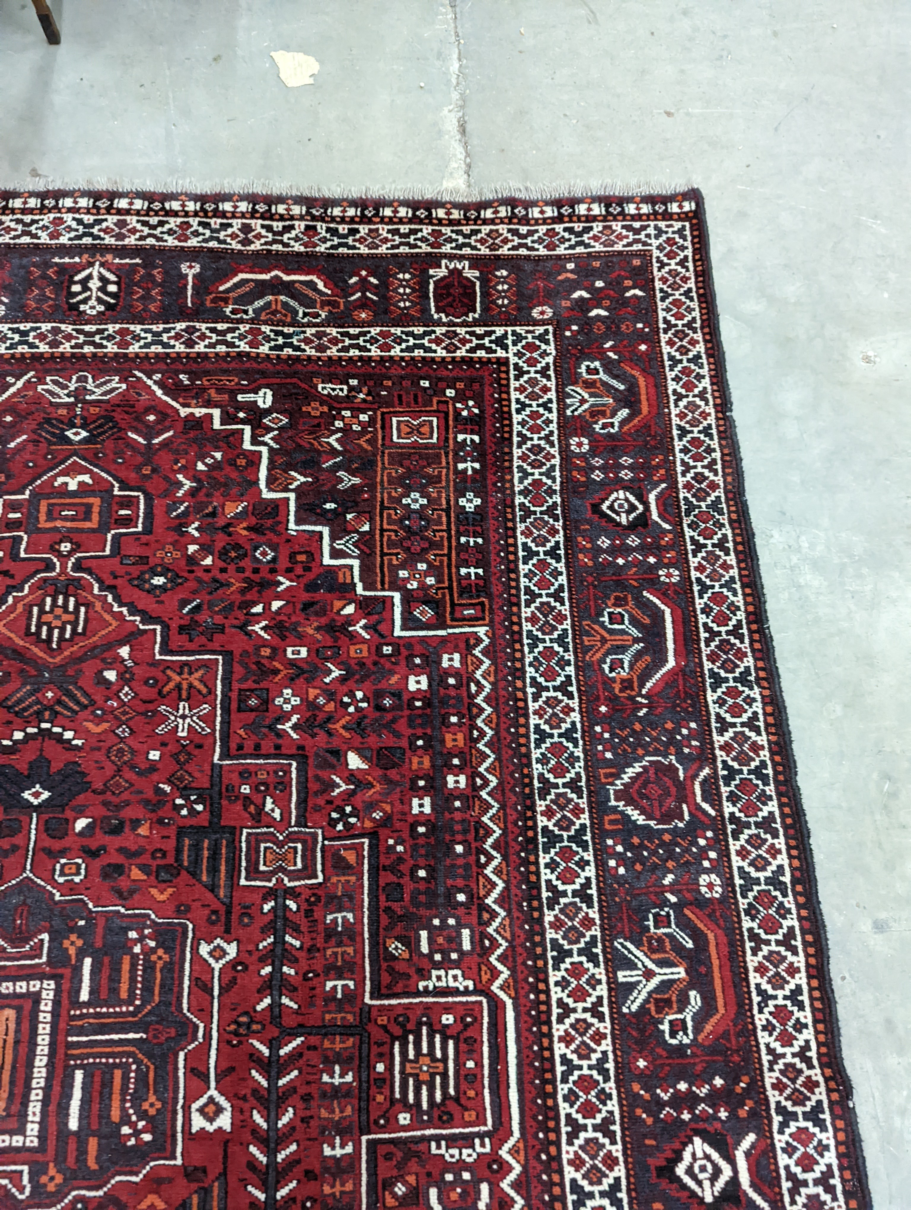 A Caucasian design burgundy ground carpet, 280 x 210cm - Image 6 of 12