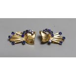 A stylish pair of mid 20th century yellow metal and sapphire cluster set fan shaped ear clips, 27mm,