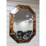 An Arts and Crafts octagonal copper wall mirror width 54cm, height 73cm