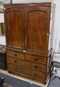 A Regency mahogany linen press, the top retaining sliding trays, length 124cm, depth 56cm, height