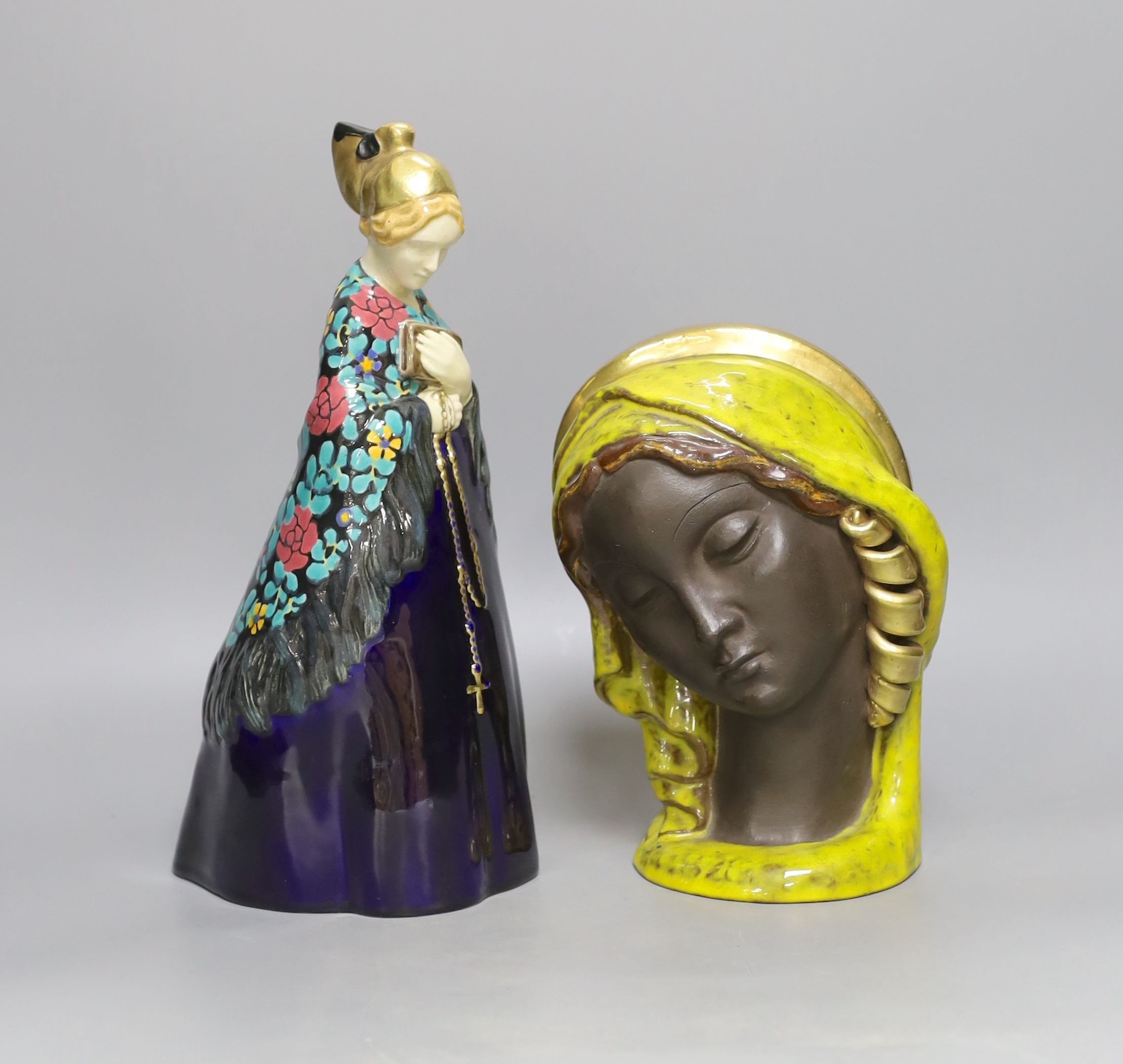 Emilie Schleiss (1880-1962), two ceramic figures including a wall mask and church goer figure