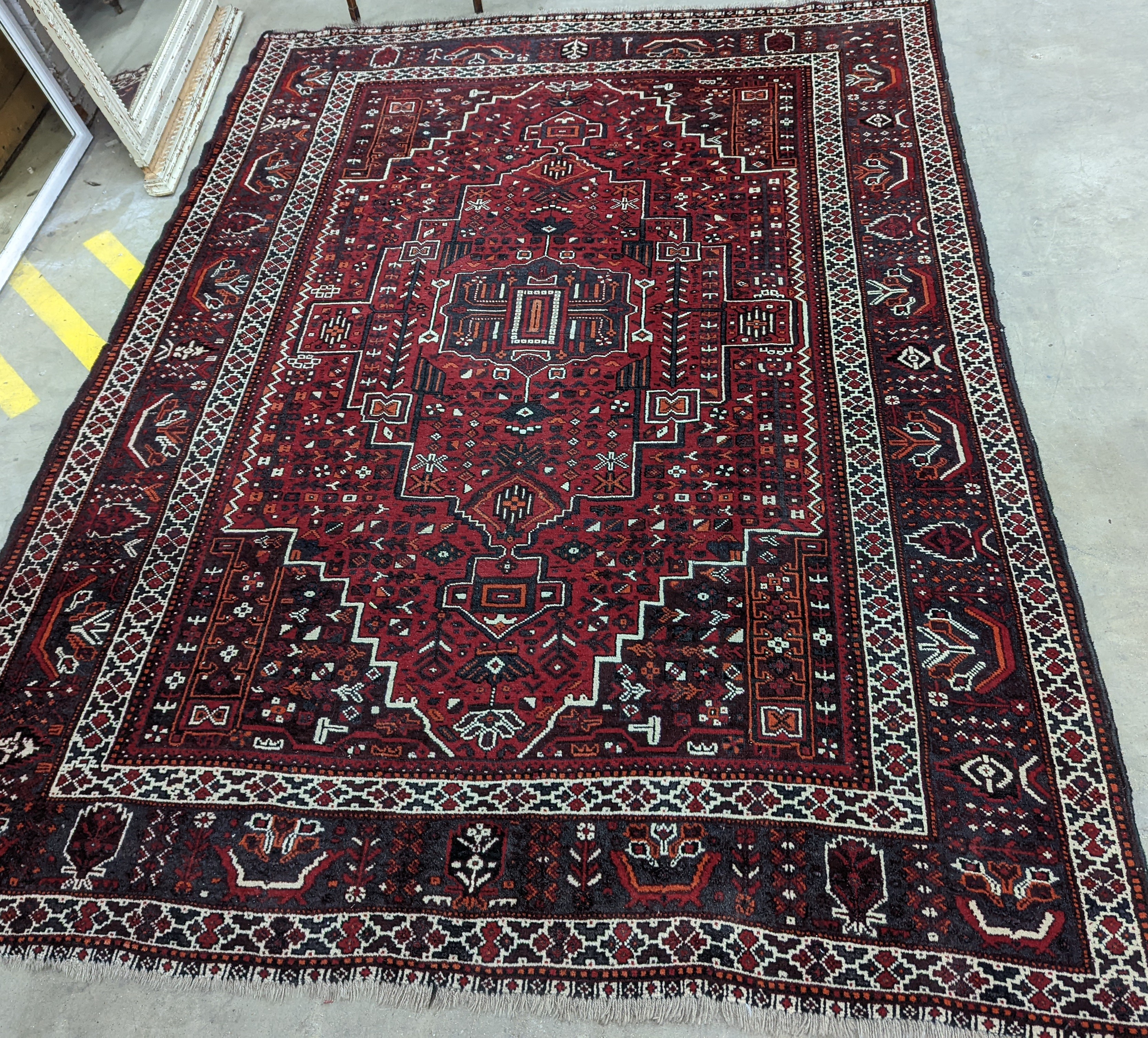A Caucasian design burgundy ground carpet, 280 x 210cm - Image 7 of 12