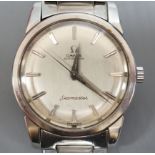 A gentleman's stainless steel Omega Seamaster Automatic wrist watch, on a stainless steel Omega
