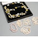 Four cultured pearl necklaces, including one double strand by Mikimoto, 46cm, three with 9ct gold