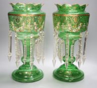 A pair of late 19th century green glass enamel lustres - 37cm high