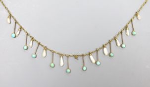 An Edwardian 9ct, baroque pearl and turquoise set drop fringe necklace, 38cm, gross 4.6 grams.