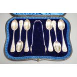 A cased set of six late Victorian silver teaspoons with sugar tongs, London, 1898.