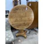 A Victorian circular pine tilt top breakfast table, diameter 92cm, height 73cm