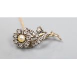 A Victorian yellow metal, pearl and rose cut diamond set flower brooch, 31mm, gross 3.6 grams.