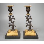 A pair of bronze and ormolu tree candlesticks - 22.5cm tall