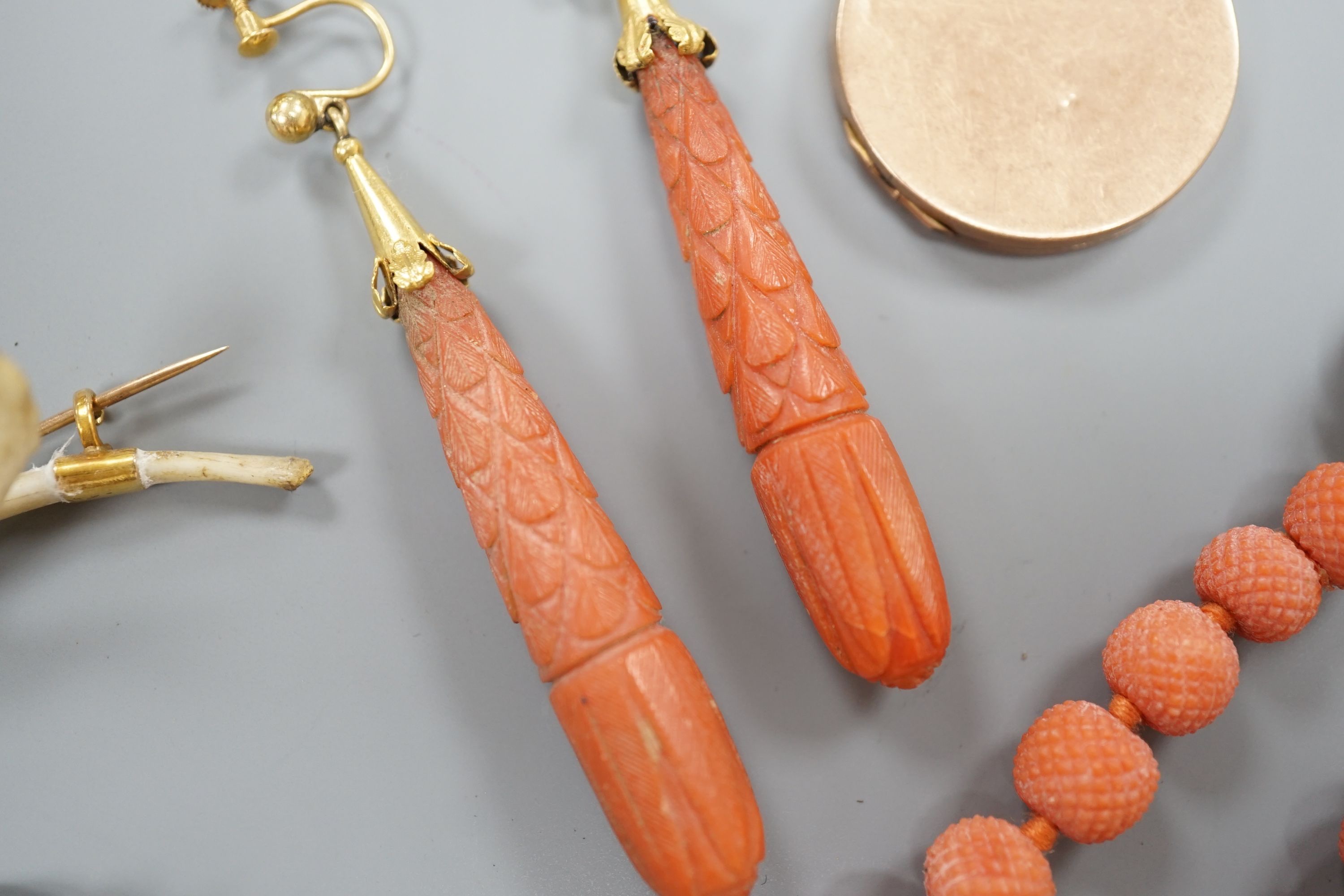 A pair of 9ct mounted teardrop shaped carved coral drop earrings, 6cm, gross 14.7 grams, a carved - Image 4 of 5