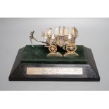 A parcel gilt white metal and enamelled miniature model of 'The Old Times Coach Made To