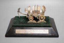 A parcel gilt white metal and enamelled miniature model of 'The Old Times Coach Made To