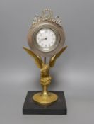A gilt metal 8 day ‘eagle’ desk timepiece with marble slab base 30cm