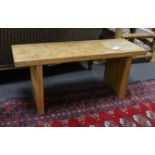 A Cotswold style small oak bench stamped 'W H Pinner', width 78cm, depth 27cm, height 34cm