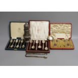 Two cased sets of six silver teaspoons including Art Deco and a cased set of Scandinavian gilt white