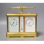 A French combination brass carriage timepiece, barometer, thermometer and compass, retailed by