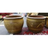 Two Chinese style circular glazed terracotta garden planters, width 49cm, height 38cm