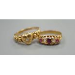 Two early 20th century 18t gold and gem set ring, including heart shape with diamond, sizes N/O