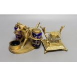 A gilt metal ‘dog’ desk stand together with a similar French style inkwell. Longest 15cm