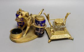 A gilt metal ‘dog’ desk stand together with a similar French style inkwell. Longest 15cm