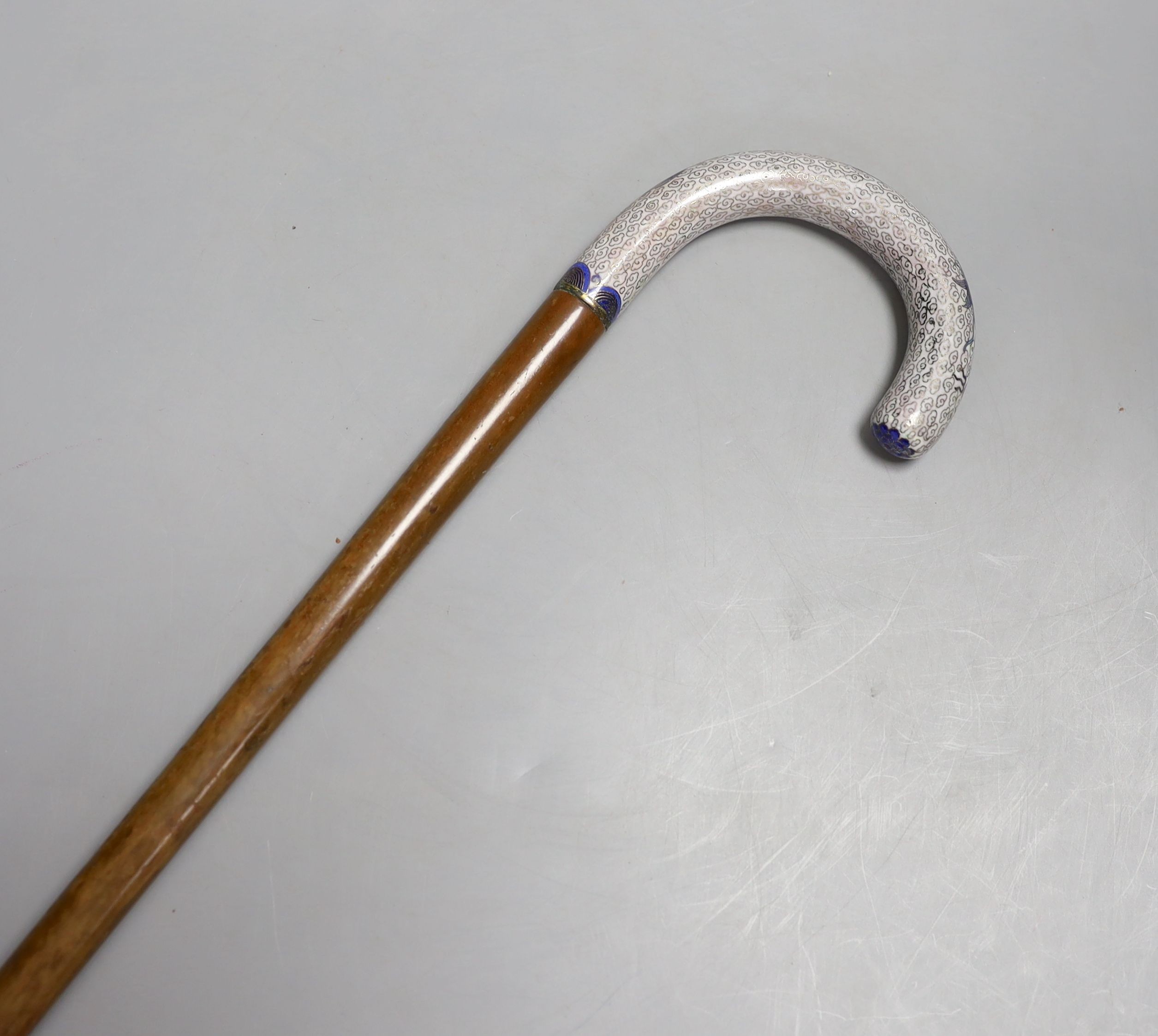 A 19th / 20th century Chinese walking stick with cloisonne handle with five claw dragon