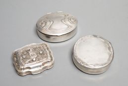 Three assorted continental white metal pill boxes including Dutch with filigree panel and German,